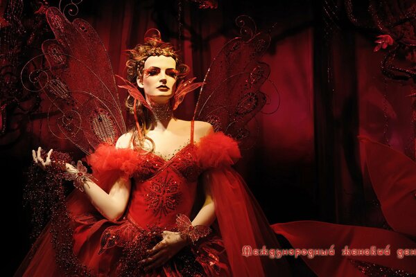 Glamour chic fille en rouge à la mascarade
