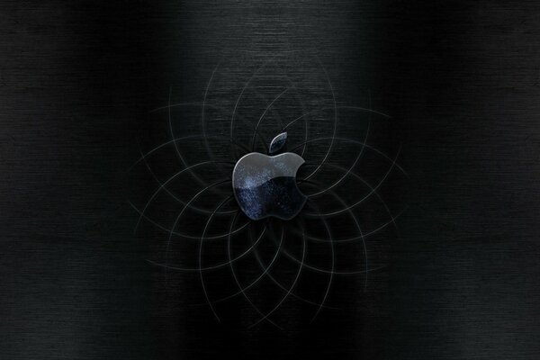 Emblème en forme de pomme sur fond noir