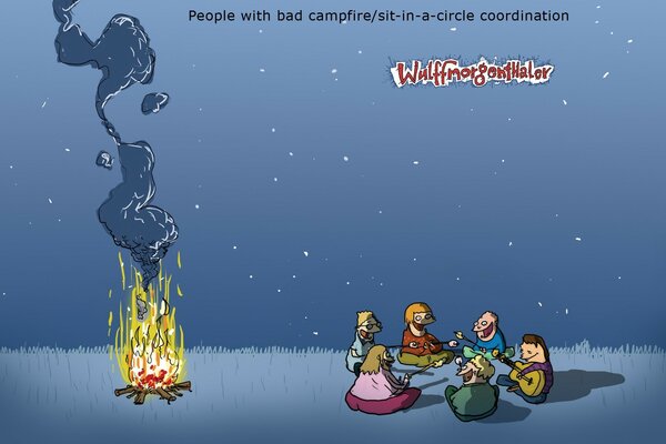 Pique-nique la nuit près d un feu de camp chaud
