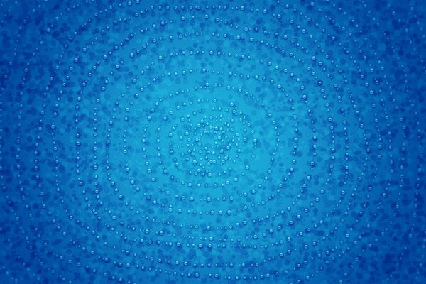 Gouttes rondes sur fond bleu