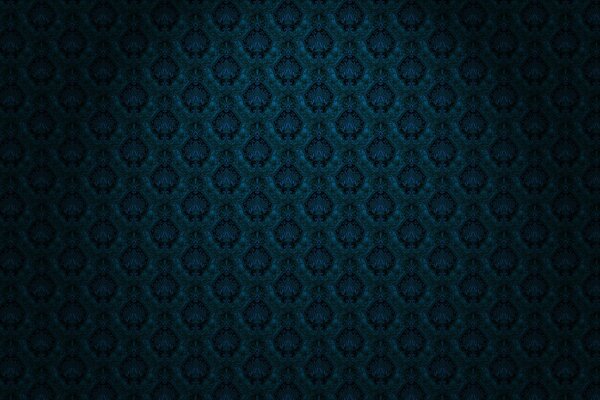 Arnament bleu-noir sur le tissu