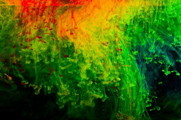 Texture inhabituelle sous la forme de gouttes de peinture rouge et verte