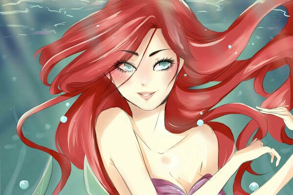 Petite sirène avec des cheveux rouges dans l eau