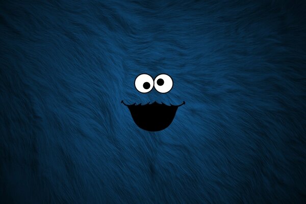Monstre bleu mignon sur fond hirsute