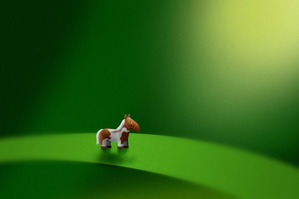 Petit poney sur une feuille verte