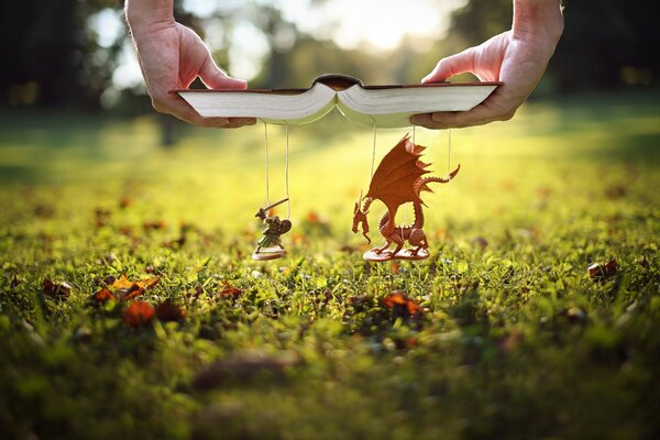 Livre avec le dragon et le chevalier