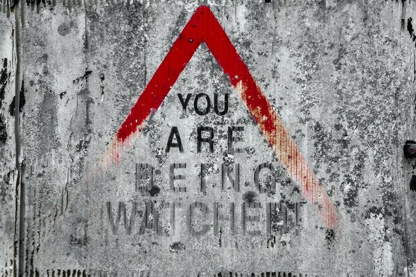 panneau d avertissement rouge vous êtes surveillé