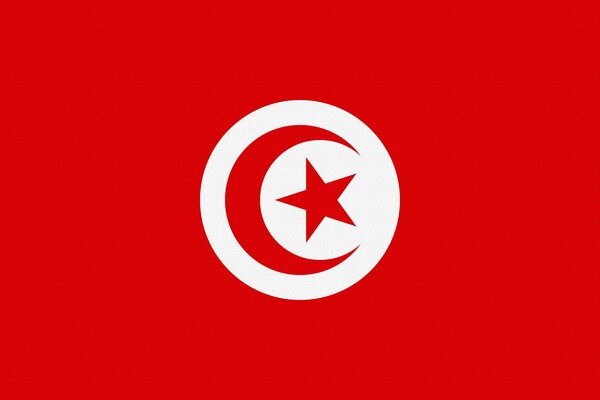 Drapeau rouge vif de la Tunisie avec le symbole de l étoile