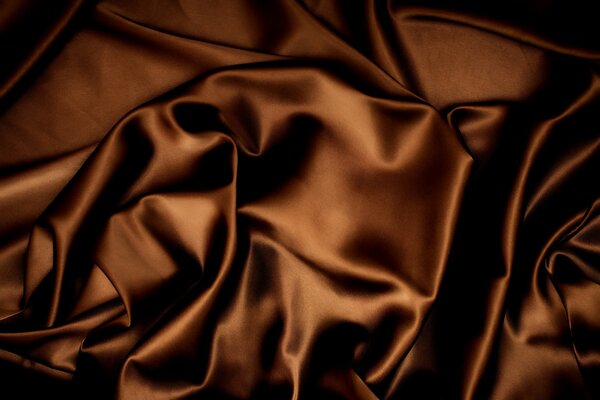 Soie de chocolat. Fond de tissu brun
