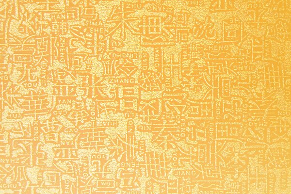 Hiéroglyphes texturés jaunes dorés