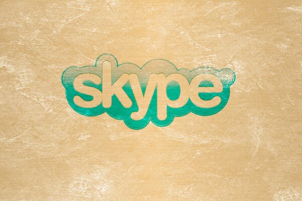 Logo Skype. Sur fond jaune