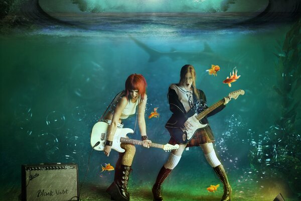 Concert de filles avec des guitares sous l eau